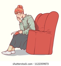 girl reading book on couch