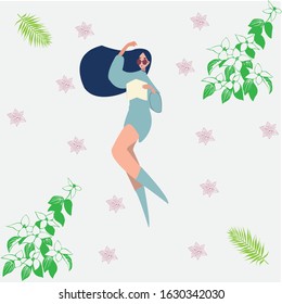 the girl is reading a book while lying relaxed enjoying nature
