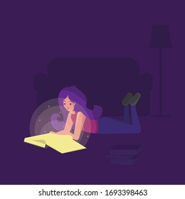 la chica lee un libro mientras está tumbada en el suelo de la habitación