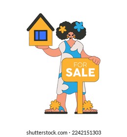 Girl realtor holds a house in her hands. Selling and owning a house.