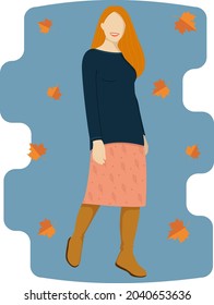 Girl with red hair in autumn clothes and boots