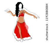 A girl in a red oriental costume dancing a belly dance.