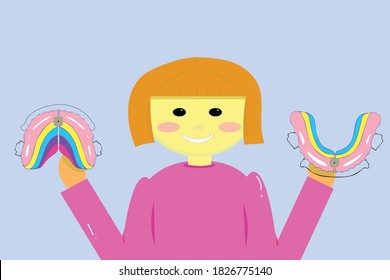 girl with removable orthodontic appliances
