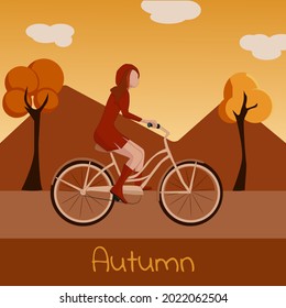 A girl rides a bicycle in an autumn park. The concept of active recreation in autumn. Vector illustration from a cartoon. September, October warm weather. Banner, leaflet in a flat style.