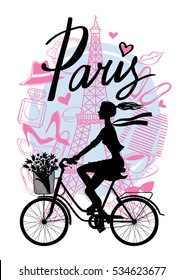 A girl rides a Bicycle. Silhouette cyclist. Paris. Vector hand drawn illustration with Eiffel tower. Fashion accessories. 