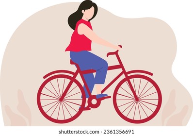 The girl is riding a bicycle.