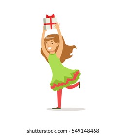 Girl Running With Present Dressed As Santa Claus Christmas Elf For The Costume Holiday Carnival Party