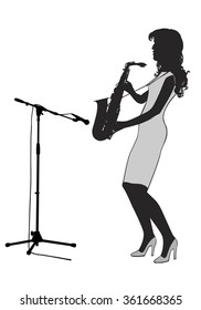 Girl saxophonist stands on the stage and playing the saxophone