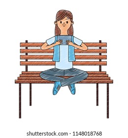 Girl seated on chair using portable videogame scribble