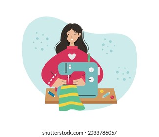 The girl sews on a sewing machine. Creative profession.