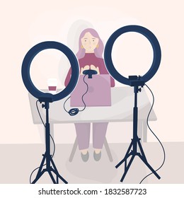 Girl shoots video on webcam in studio with ring light on tripods. Blogger sitting at the table with laptop and streaming. Webinar recording. Vector flat illustration