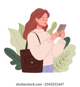 A girl with a shopping bag looks at the phone. Tropical leaves are in the background.