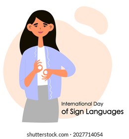 The girl shows gestures with her hands. Inscription International Day of Sign Languages. Vector flat illustration