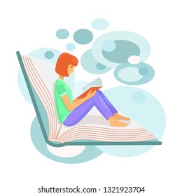 A girl sits in a book and reads a book.