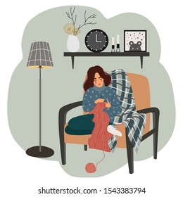 The girl sits in a chair by the floor lamp and knits against the background of the interior shelf with a clock, a vase, a picture and candles. Scandinavian style. Vector cute flat illustration