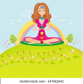 girl sits and meditates - chakra points