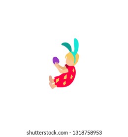 girl sits on the ground and holds an easter egg. on the head bunny ears.