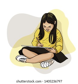 girl sits and writes on the tablet