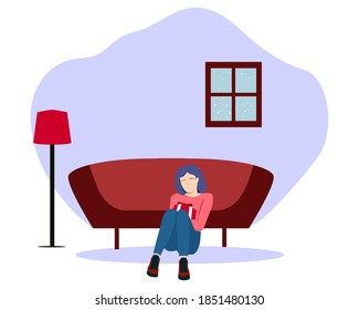 A girl sitting alone and holding a gift in the Christmas night event celebration