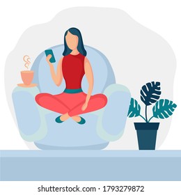 Girl sitting in armchair at home. Woman with phone on the chair. Freelance or studying concept. Female character, chatting online using smartphone, drinking hot tea or coffee.