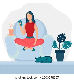 Girl sitting in armchair at home. Woman with phone on the chair. Freelance or studying concept. Female character, chatting online using smartphone, drinking hot tea or coffee.