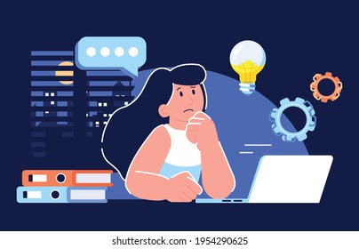 A girl sitting in front of a computer thinking