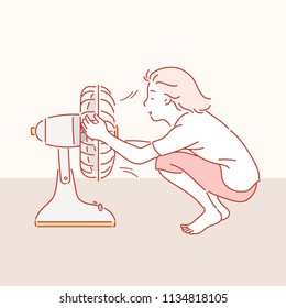 The girl is sitting in front of the electric fan and cooling the heat. hand drawn style vector design illustrations.