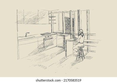 Niña sentada en la cocina y tomando té