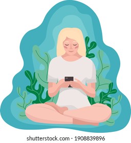 Girl sitting in a lotus position with a phone in her hands. Blonde girl on a background of green leaves and blue clouds. Girl in the park. Communication with loved ones in social networks. 