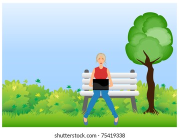 Girl sitting on a bench in the park and working for laptop