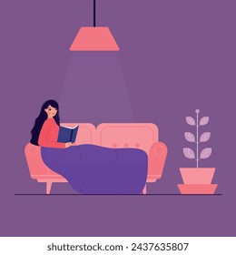 Girl sitting on the couch reading a book