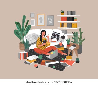 A Girl Is Sitting On The Floor Surrounded By A Laptop, Books And Papers And Writing In Note. Woman Studying Or Preparing For Exams At Home. Teen Student Studying Hard In Scandinavian Home Interior
