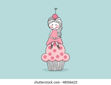 girl sitting on giant cupcake