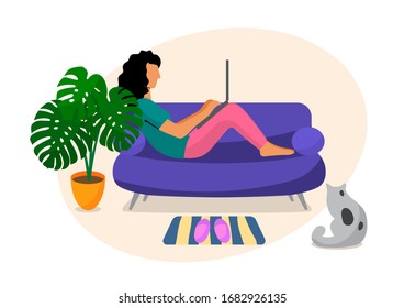 Girl sitting on sofa with computer, work from home with cat and plant