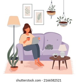 The girl is sitting on the sofa with a laptop and a cat. Cozy home interior. Freelance and remote work. Vector illustration.