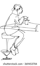 
 girl sitting at a table in a cafe on a highchair