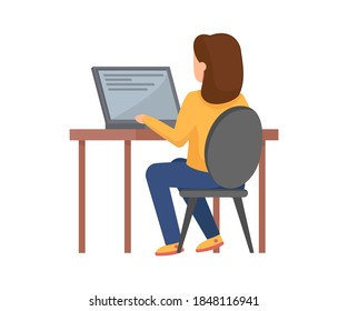The girl is sitting at a table with a computer. Online learning.