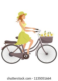 A girl in a skirt and a shirt on a bicycle with daisies.
