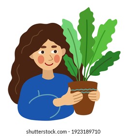 The girl smiles and holds a houseplant in a pot in her hands. She looks at him lovingly. The girl has brown hair and a blue sweater. Vector image, clipart.