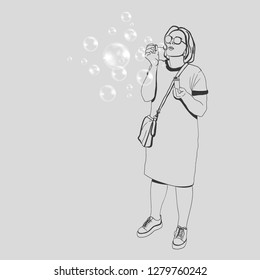 Girl and soap bubbles