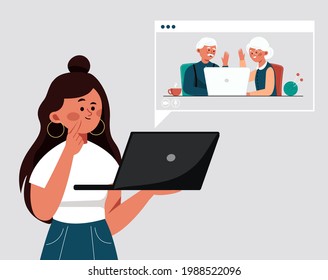 Girl speaks by video link with her grandparents. Elderly couple pensioner parents communicating with daughter by video link at computer with camera