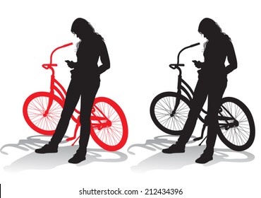 girl standing with a bicycle on a walk