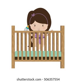 girl standing in crib with baby bottle