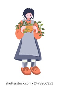 Сute girl is standing and holding a pot with indoor plants. Ideal for greeting cards, posters and social media. Perfect for home planting lovers and cozy home decor.