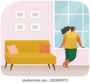 Girl standing next to windowsill and looking at moon outside window. Female character spends time at home at night. Child in children's room looks at sky. Stylish interior of room for kids