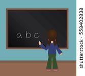 Girl student writing alphabet letter on blackboard. Flat design cartoon vector of a kid in classroom in school.
