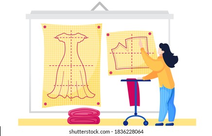 Girl studying the plan for clothes. Fashion designers making a pattern on yellow paper. Future cloth planning. The girl points to the image of the dress scheme. Preparation for tailoring and sewing