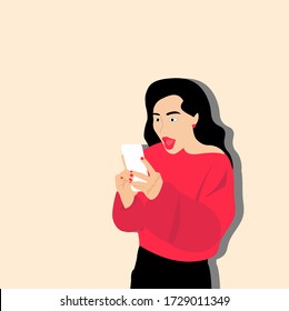 Niña sorprendida al mirar su teléfono.