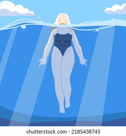 a girl in a swimsuit swims underwater. Summer rest