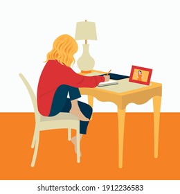 
das Mädchen am Tisch arbeitet